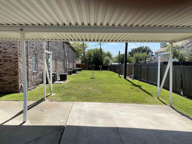 view of yard featuring a patio area and cooling unit