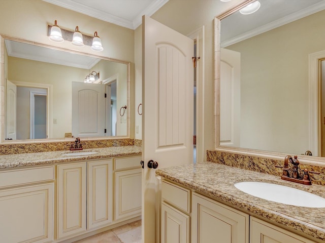 bathroom featuring crown molding and vanity