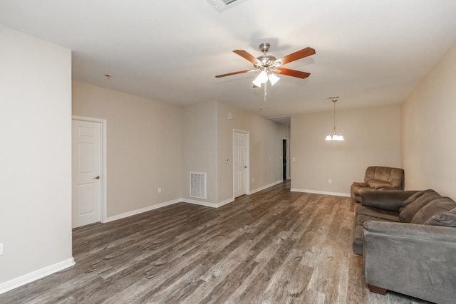 9205 Shepherd Dr, Beaumont, TX 77707 - living room with wood finished floors, a ceiling fan, and baseboards