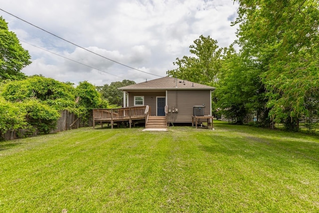 9205 Shepherd Dr, Beaumont, TX 77707 - back of house with a wooden deck