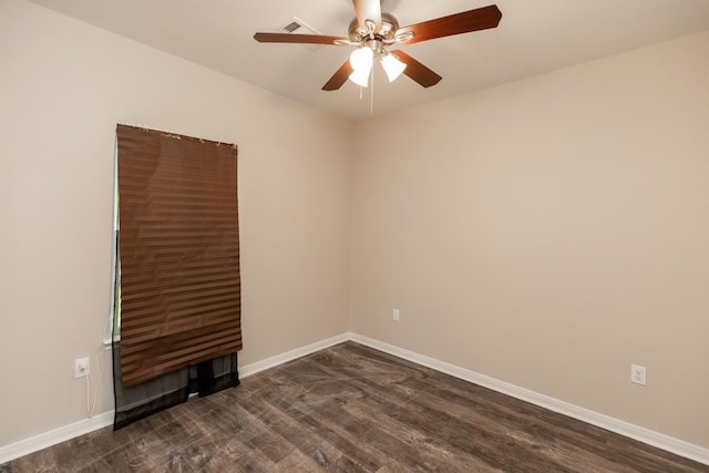 9205 Shepherd Dr, Beaumont, TX 77707 - unfurnished room with a ceiling fan, baseboards, and dark wood-type flooring