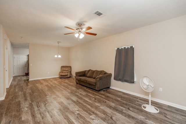 9205 Shepherd Dr, Beaumont, TX 77707 - sitting room with attic access, wood finished floors, and baseboards