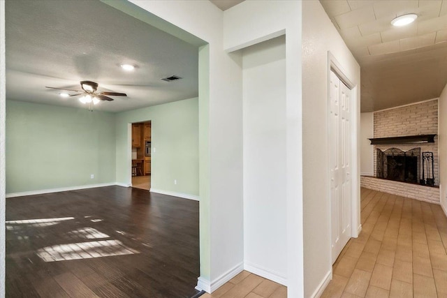 corridor featuring light hardwood / wood-style flooring