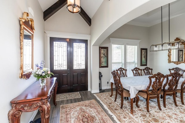 foyer entrance with high vaulted ceiling