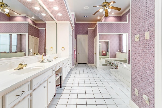 bathroom with tile patterned floors, vanity, ceiling fan, crown molding, and independent shower and bath