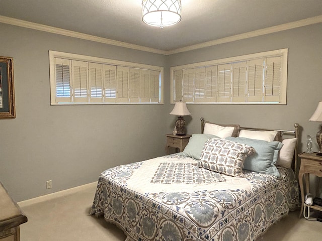 bedroom featuring carpet flooring and ornamental molding