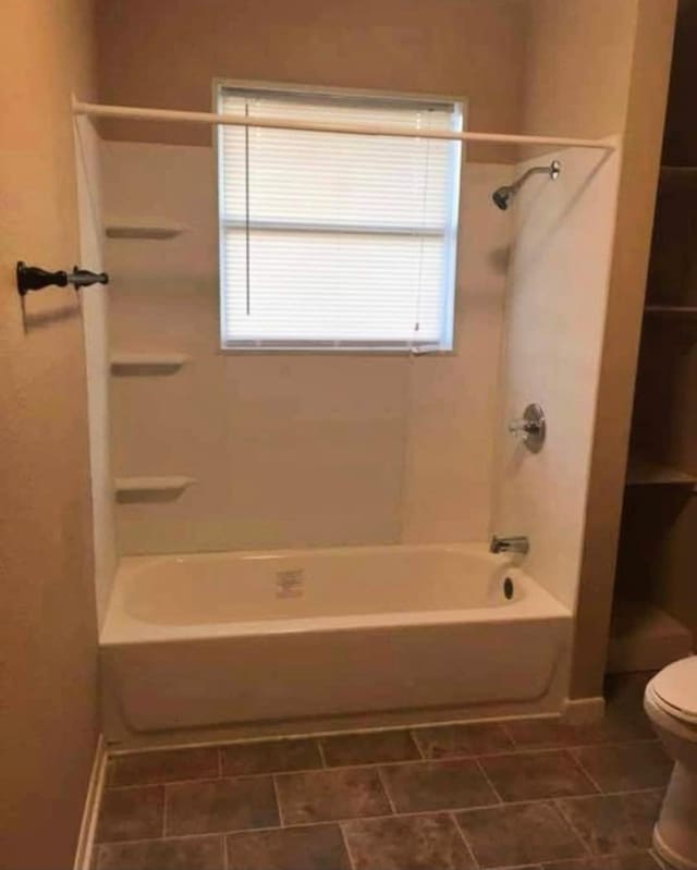 434 US Highway 96, Buna, TX 77612 - bathroom with toilet and shower / bath combination