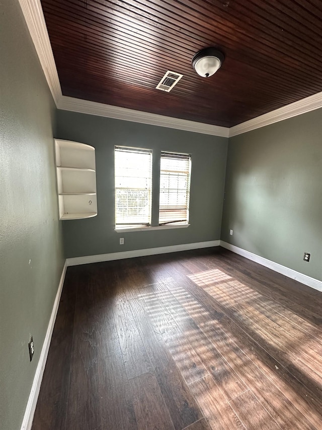 empty room with crown molding, wooden ceiling, and dark hardwood / wood-style floors