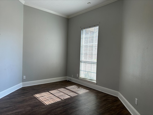 unfurnished room with crown molding and dark hardwood / wood-style floors