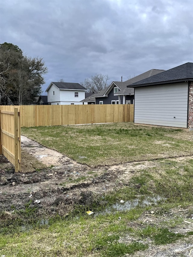 view of yard with fence