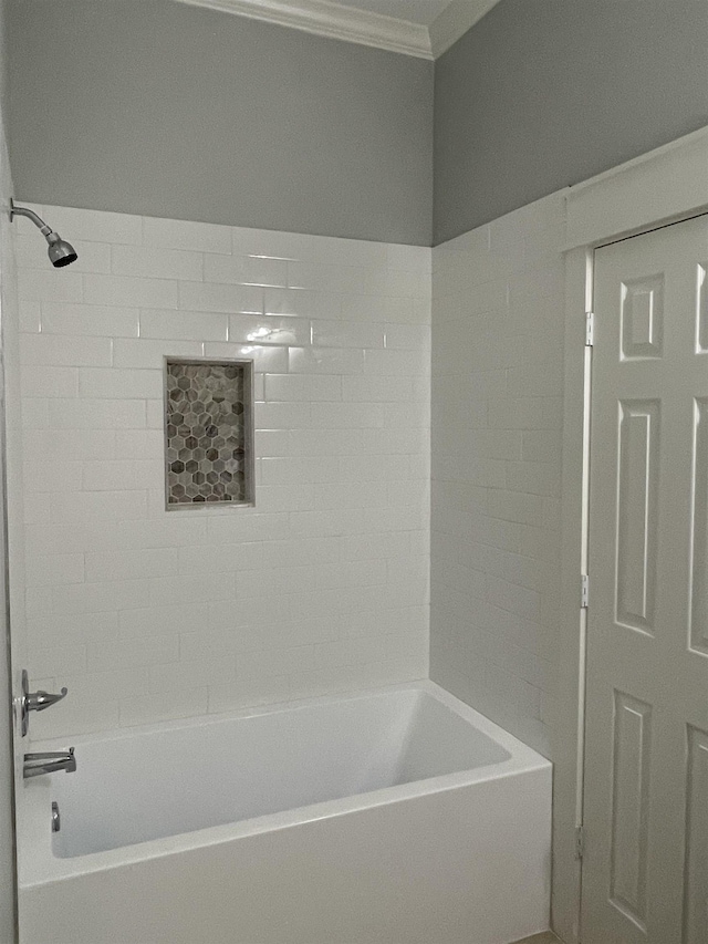 bathroom featuring shower / bath combination and crown molding