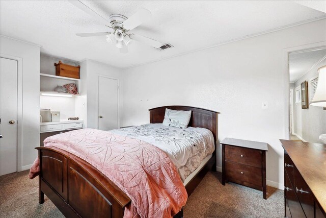 2414 Goodwin Ct, Port Neches, TX 77651 - carpeted bedroom with a ceiling fan and visible vents