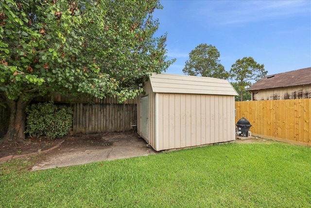 view of shed featuring a fenced backyard
