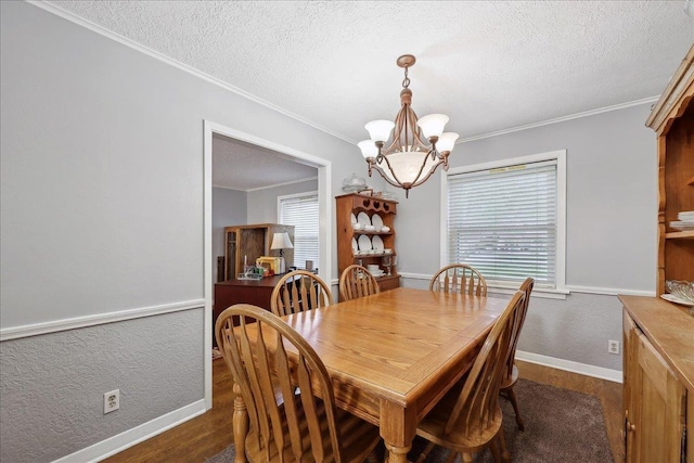 dining space with an inviting chandelier, plenty of natural light, a textured ceiling, and dark wood-type flooring