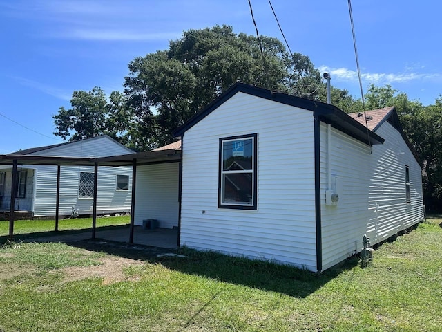 1117 W Dr, Port Neches, TX 77651 - view of side of home featuring a lawn