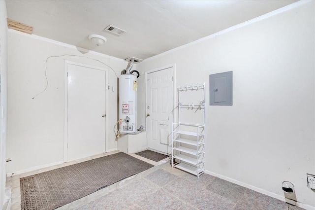 foyer featuring gas water heater and electric panel