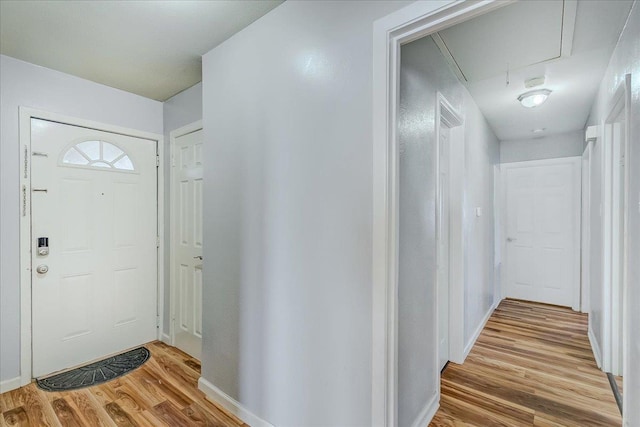 entrance foyer with light hardwood / wood-style flooring