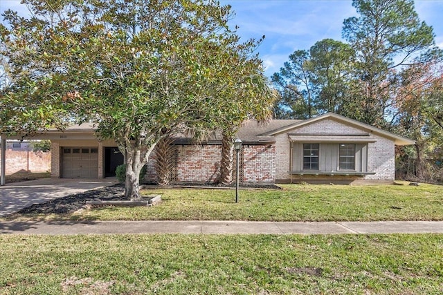 view of front facade featuring a garage and a front lawn