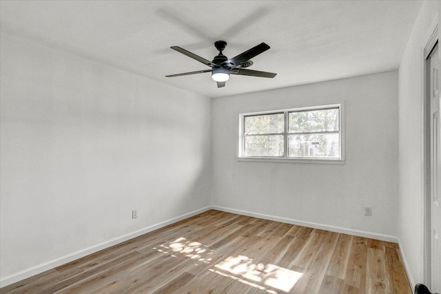 spare room with ceiling fan and light hardwood / wood-style floors