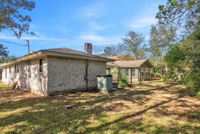 view of home's exterior featuring a lawn