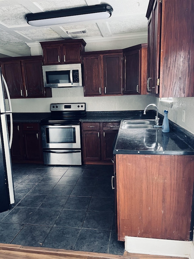 kitchen featuring sink and appliances with stainless steel finishes