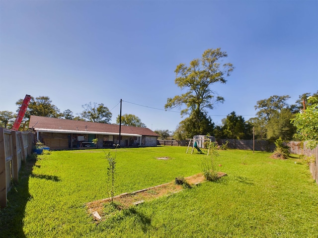 view of yard with a playground