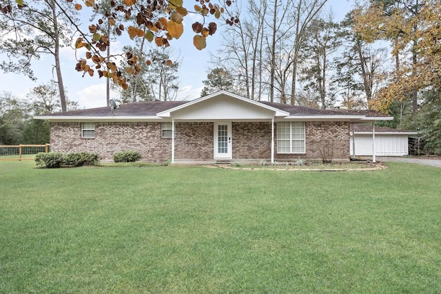 single story home featuring a front lawn