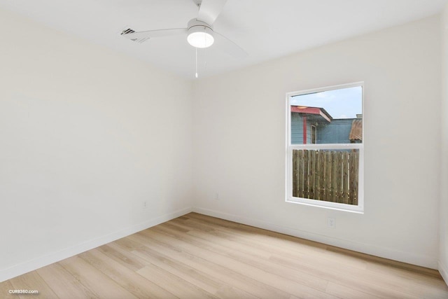 381 Perryman St, New Braunfels, TX 78130 - unfurnished room with baseboards, ceiling fan, and wood finished floors