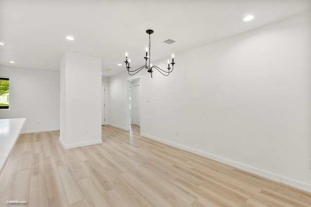 381 Perryman St, New Braunfels, TX 78130 - unfurnished dining area featuring visible vents, recessed lighting, light wood-style flooring, and a notable chandelier