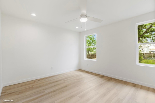 381 Perryman St, New Braunfels, TX 78130 - unfurnished room featuring baseboards, ceiling fan, plenty of natural light, and light wood-style flooring