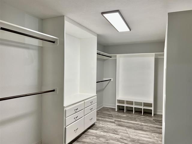 7600 Oakmont Dr, Port Arthur, TX 77642 - spacious closet featuring light wood-style flooring