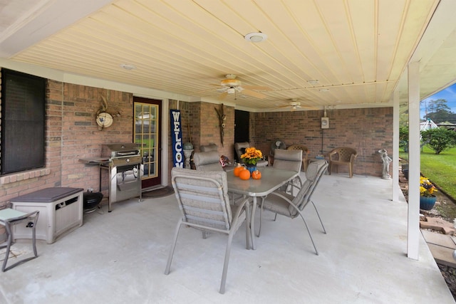 view of patio / terrace featuring grilling area, ceiling fan, and outdoor dining space