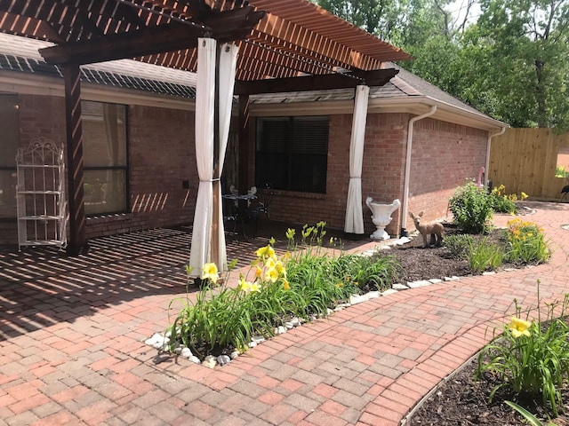 12 Encore Cir, Orange, TX 77630 - view of patio featuring a pergola and fence