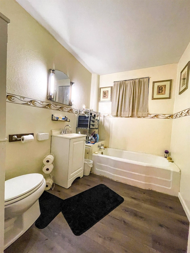 3832 W Park Ave, Orange, TX 77630 - full bathroom with a bath, wood finished floors, and vanity