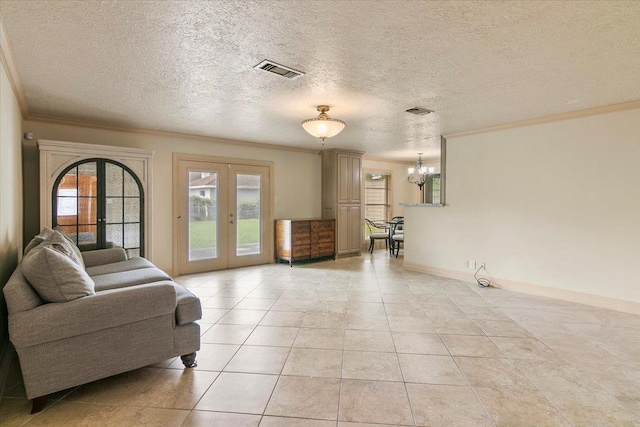 living room with french doors, crown molding, a chandelier, a textured ceiling, and light tile patterned floors