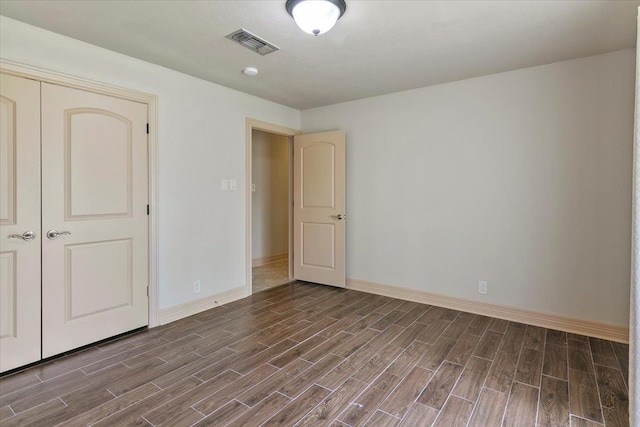 unfurnished bedroom with a closet