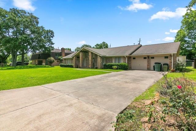 ranch-style home with a garage and a front lawn