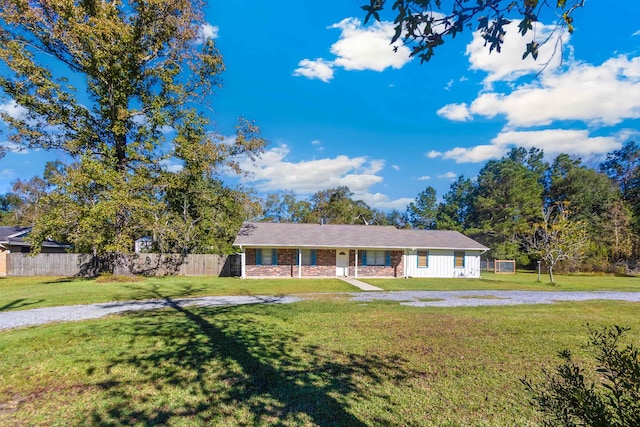 ranch-style house with a front yard