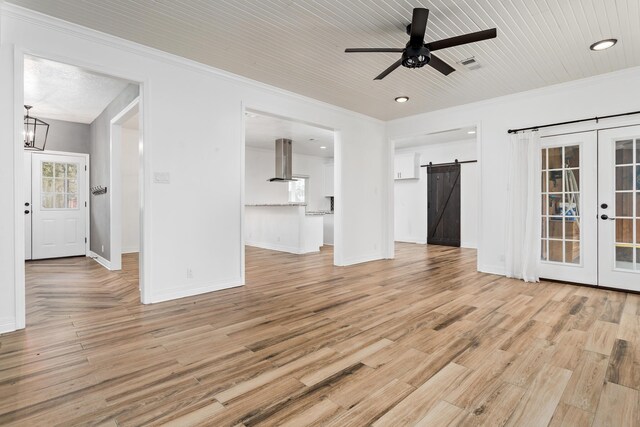 446 Piney Point Dr, Sour Lake, TX 77659 - interior space with french doors, light wood-style flooring, and crown molding
