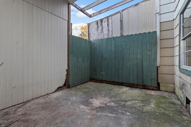 view of side of home featuring a patio area