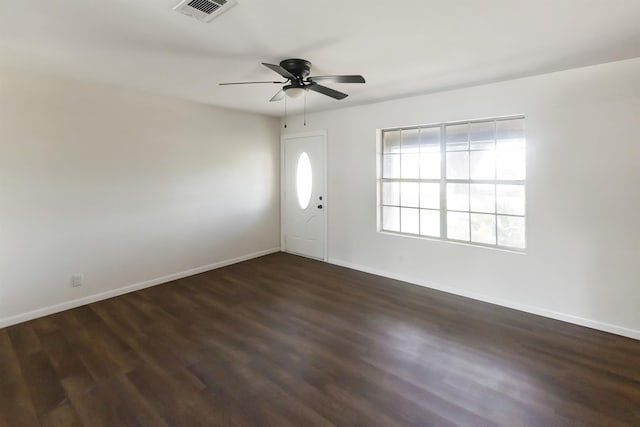 entryway with ceiling fan and dark wood-type flooring