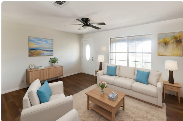 living room featuring hardwood / wood-style flooring and ceiling fan