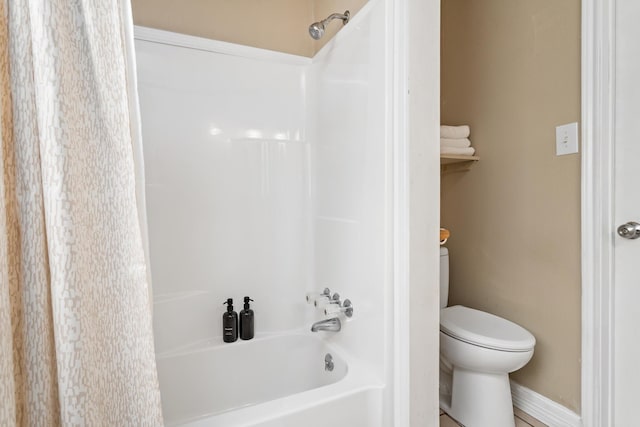 10775 Old Voth Rd, Beaumont, TX 77713 - full bath featuring shower / bath combo, toilet, and baseboards