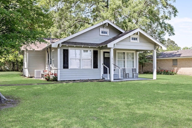 10775 Old Voth Rd, Beaumont, TX 77713 - bungalow featuring a front yard, roof with shingles, and central air condition unit
