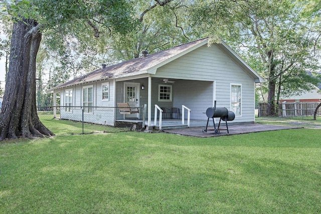 10775 Old Voth Rd, Beaumont, TX 77713 - rear view of property with ceiling fan and a patio