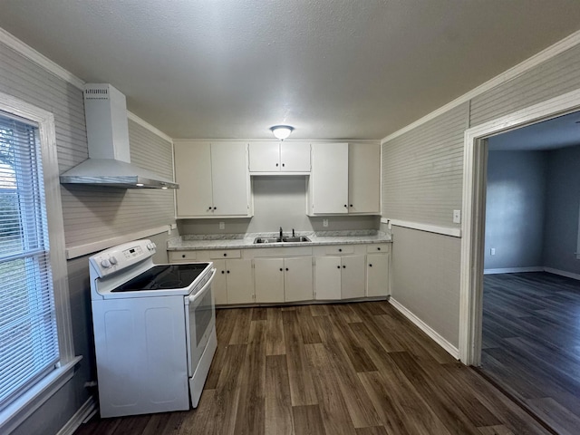 kitchen featuring sink, white range with electric cooktop, white cabinetry, ornamental molding, and wall chimney exhaust hood