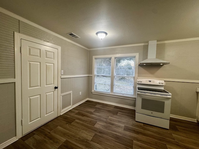 kitchen featuring crown molding, white range with electric cooktop, wall chimney exhaust hood, and dark wood-type flooring