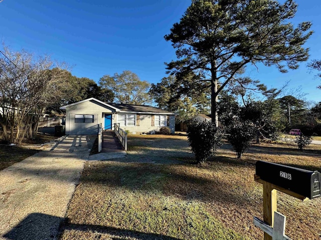 view of front of house with a front lawn