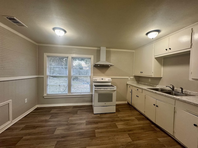 kitchen featuring dark hardwood / wood-style floors, white electric stove, sink, white cabinets, and wall chimney exhaust hood