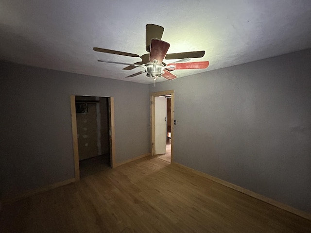 138 Ned Rd, Lumberton, TX 77657 - unfurnished room with wood finished floors, a ceiling fan, and baseboards